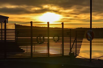 Built structure against sky during sunset