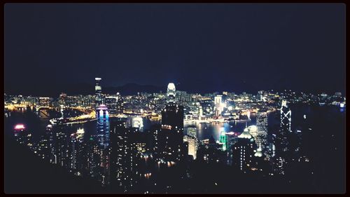 Illuminated cityscape at night