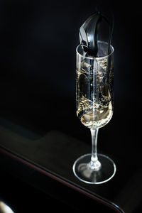 Close-up of wine in glass on table