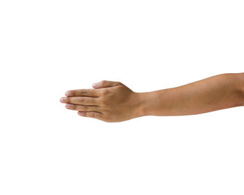 Close-up of person hand against white background