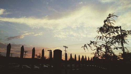 Low angle view of cloudy sky at sunset