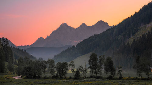 Scenic view of mountains against sky during sunset