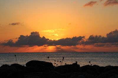 Scenic view of sea against sky during sunset