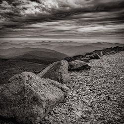 Rocks on land against sky