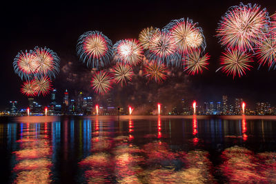 Firework display at night