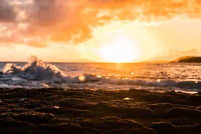 Scenic view of sea against sky during sunset