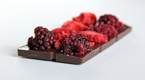 Close-up of pastry on white background