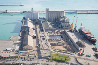 High angle view of commercial dock by sea