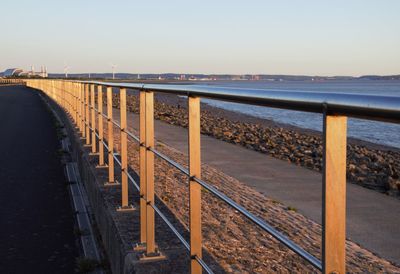 Golden hour severnbeach sea wall rails