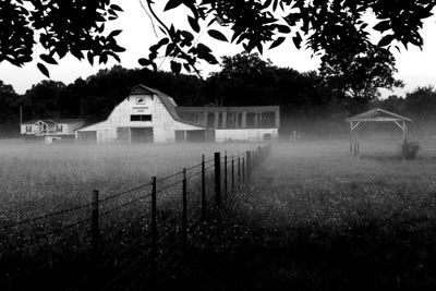 House on field against sky