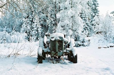 Frozen tractor on snow