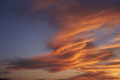 Low angle view of dramatic sky during sunset