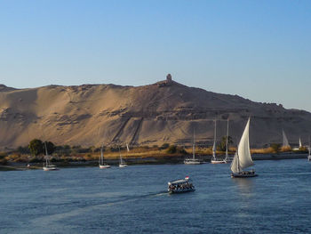 Boats sailing in sea