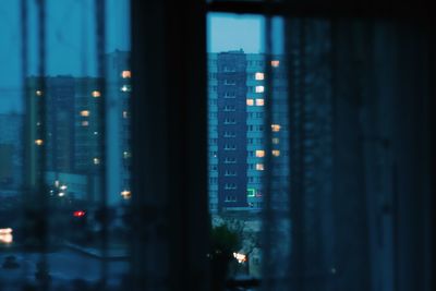 Defocused image of illuminated building at night