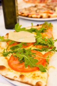 Close-up of pizza served in plate
