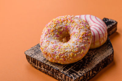Close-up of donut on yellow background