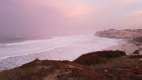 Scenic view of sea against sky during sunset