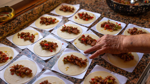 Woman making patty