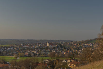 High angle shot of townscape against clear sky