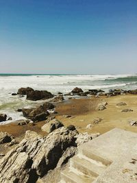 Scenic view of sea against clear sky