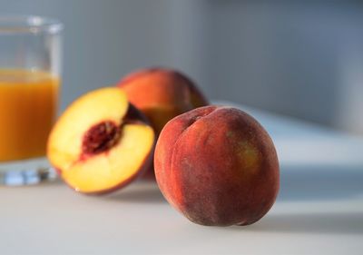 Close up view on peaches at table