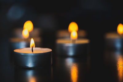 Close-up of burning candles