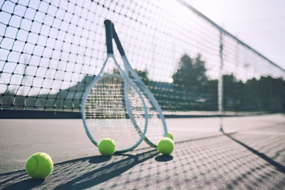 Tennis balls on playing field