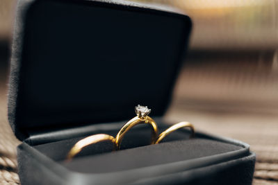 Close-up of wedding rings on metal