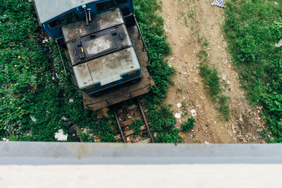 High angle view of abandoned truck on field