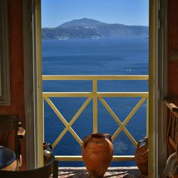 Scenic view of sea seen through window