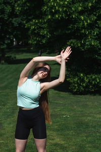 Woman exercising in park