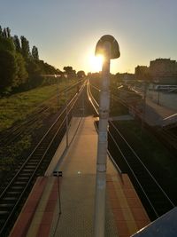 High angle view of railroad tracks at sunset