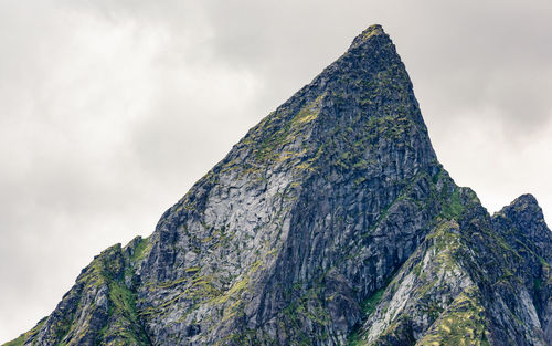 Low angle view of rock against sky