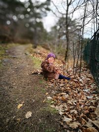 Woman in autumn tree