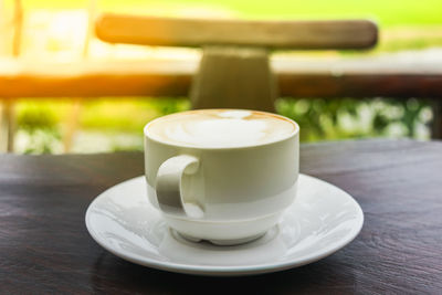 High angle view of coffee cup on table