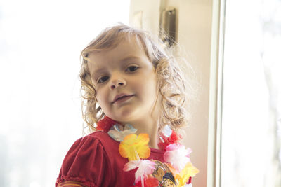 Girl wearing floral garland