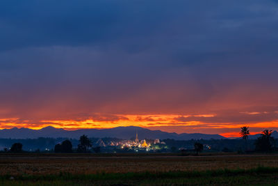 Silhouette landscape against sky during sunset