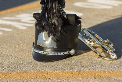 A shako, gauntlet and trumpet waiting to perform