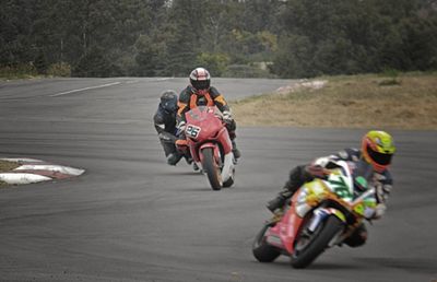 Man riding motorcycle on road