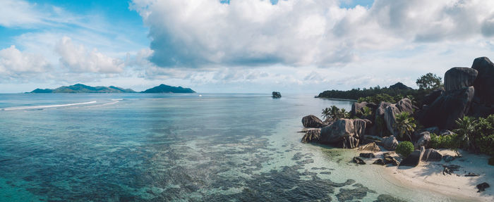 Panoramic view of sea against cloudy sky