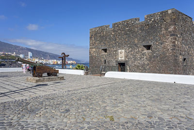 View of historic building against blue sky