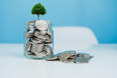 Close-up of coins on table