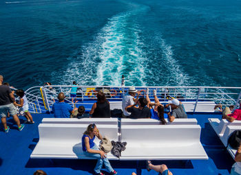 High angle view of people on boat in sea