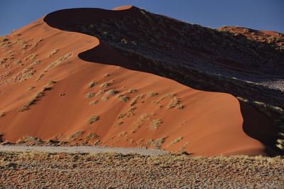 Scenic view of namib desert dunes in lights and shadows