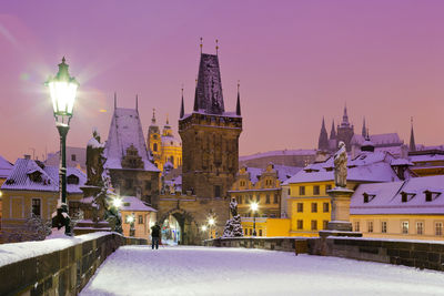 View of illuminated city at dusk