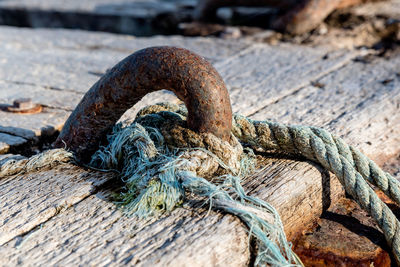Close-up of rope on rusty metal