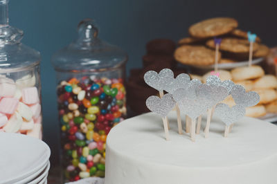 Close-up of white cake with hearts