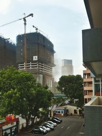 Buildings in city against sky