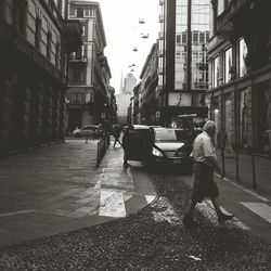 Full length of woman standing in city