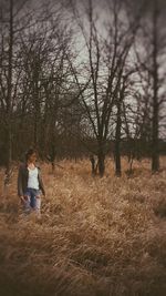 Woman standing on field